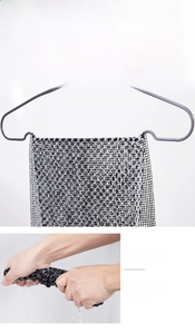 Detail of double-sided exfoliating bath towel with quick-dry mesh texture for body scrubbing