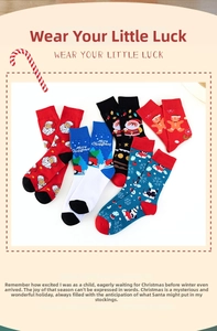 Detail view of cotton Christmas socks with Santa and gingerbread man holiday patterns
