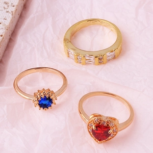 Three-piece gold-plated ring set with red heart, blue star, and white square zircon
