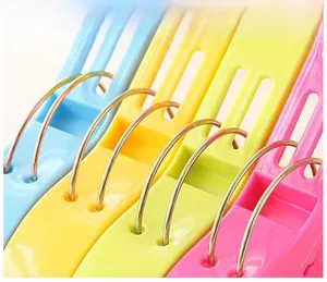 Close-up of durable multicolor large plastic laundry clips for heavy quilts and bedsheets