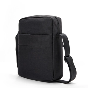Minimalist black oxford fabric messenger bag with adjustable strap and front pocket