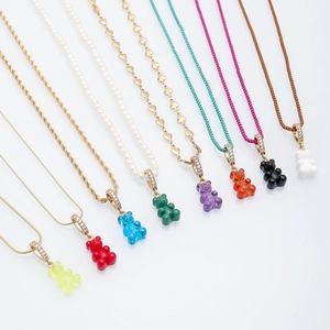Colorful gummy bear pendant necklaces in gold chains, pearls, and cord styles set