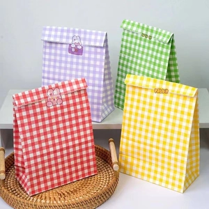 Colorful plaid checkered kraft paper gift bags with rabbit stickers for party favors