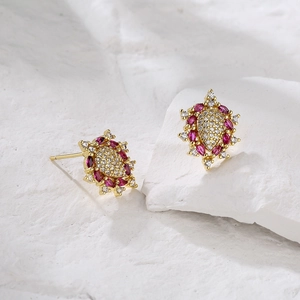 18K gold plated earrings with white zircons and red marquise stones on white stone base