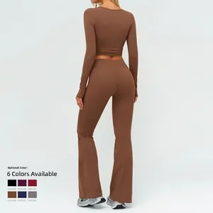 Set yoga marrone da donna con crop top a maniche lunghe e pantaloni a zampa alta