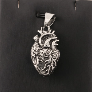 Realistic stainless steel anatomical heart pendant necklace with intricate vascular textures