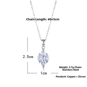 Macro view of geometric purple zircon pendant showing 2.5x1cm size dimensions