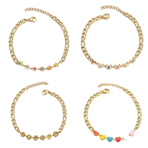Detail of four gold Figaro bracelets with colorful enamel flower, moon, sun, and heart charms