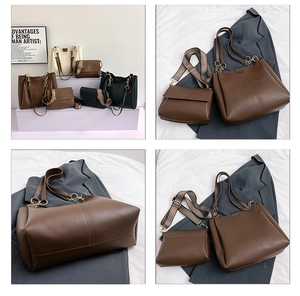 Detail view of 2-piece tote bag set in brown, black, and beige faux leather with strap