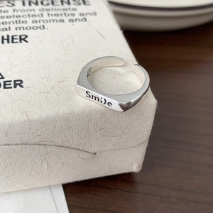Minimalist 925 sterling silver open ring with smile engraving on textured box