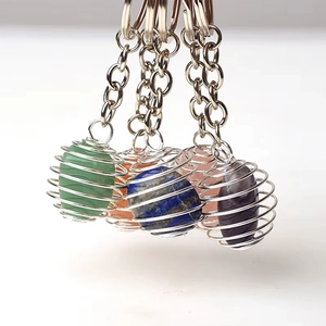 Polished natural gemstone spiral cage keychains with amethyst and aventurine stones