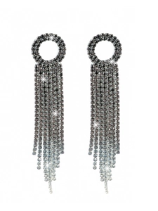 Detail of long tassel rhinestone earrings with black and silver gradient fringes