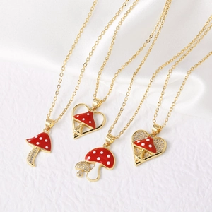 Gold-plated mushroom heart necklace set with red enamel and sparkling zircon accents