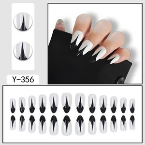 Long almond press-on nails with bold black and white flame design, set of 24 pieces