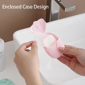 Portable pink soap paper dispenser for travel with dustproof flip-top cover and thin soap sheets