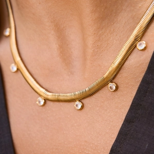 Gold plated snake chain necklace for women with sparkling round crystal embellishments