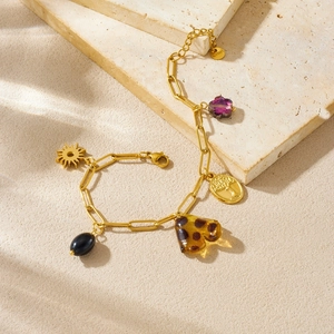 Gold stainless steel bracelet with tree of life and leopard print charms on stone