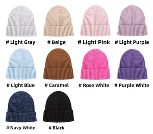 Close-up of ribbed knit baby beanies in ten various solid and mixed colors for winter