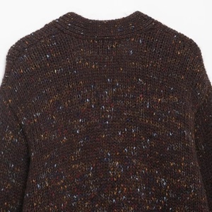 Vintage brown V-neck knit cardigan with colorful flecks shown from a back view perspective
