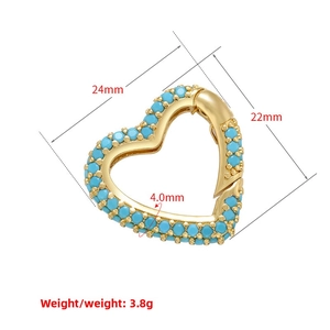 Detailweergave van hartvormige turquoise sluiting met afmetingen en gewichtsgegevens