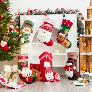 Large Christmas stockings with 3D Santa and Reindeer designs for holiday wall decor