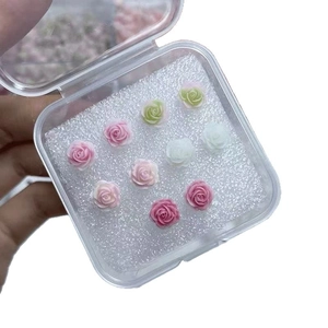 10-piece set of mini resin flower stud earrings in pastel colors with storage case