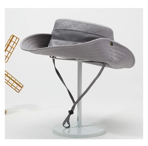 Detail of light gray sun hat featuring breathable mesh panel and adjustable chin strap