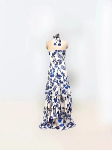 Blue and white floral halter neck maxi dress with layered ruffle skirt back view