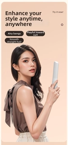 Asian model holding a portable cordless white ceramic hair straightener for styling