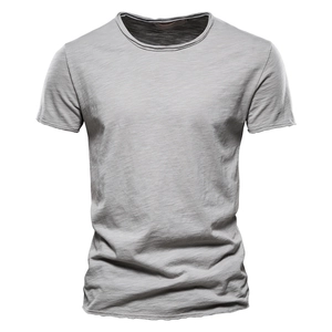 Detailed texture of grey slub cotton fabric on a men's V-neck short sleeve T-shirt