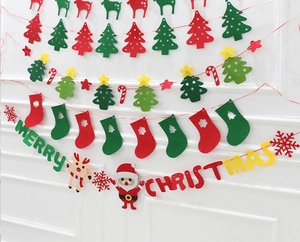 Detail of felt Christmas banners with Merry Christmas letters and holiday patterns