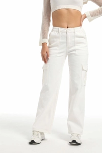 Detail of white high-waisted cargo pants showing side utility pockets and fabric texture