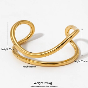 Polished gold wavy cuff bracelet detail with dimensions 28mm to 35mm and 47g weight