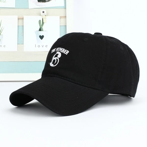 Classic black cotton baseball cap with The Number 6 embroidery and curved brim