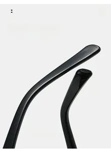 Macro shot of curved black aviator sunglasses temples showing ergonomic design