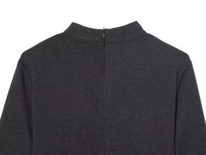 Detailed back view of the dark grey dress showing hidden zipper and standing collar