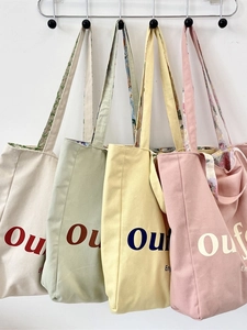 Floral lined canvas tote bags with letter print in beige, green, yellow and pink