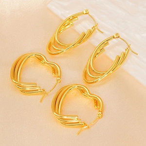 Three-layered golden stainless steel hoop earrings in minimalist geometric design