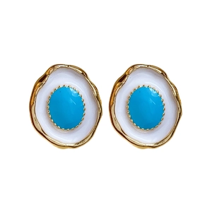 Vintage gold-plated oval stud earrings with sky blue stone and white enamel accents