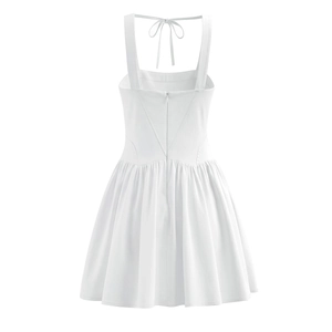 White square neck mini slip dress featuring an open back with bow tie and zipper closure
