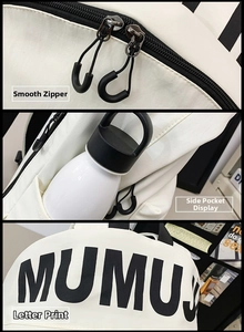 Detail view of smooth double zippers, convenient side pocket and MUMU letter print on backpack