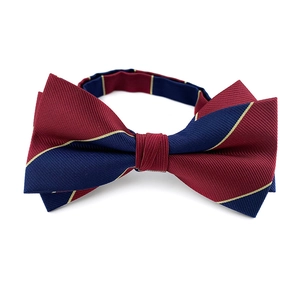Classic men's bowtie with red, blue, and gold stripes on textured fabric for weddings