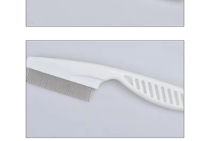 Detail of dense metal teeth on a white flea comb for dogs and cats cleaning