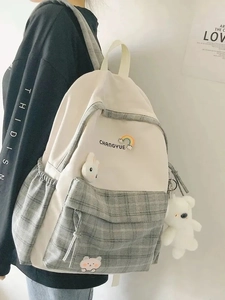 Minimalist white and grey plaid school backpack with cute rabbit and bear charms