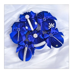 Detailed view of 8cm dark blue velvet Christmas balls with rhinestones and bows, set of 6