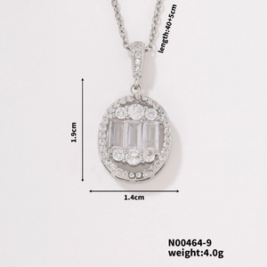 Detailed view of silver oval necklace with sparkling cubic zirconia on a white background