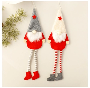 Detail of plush Christmas gnome ornaments with striped long legs and starry pointed hats