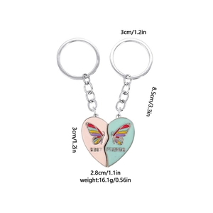 Detail showing magnetic heart keychains with butterfly design and product dimensions