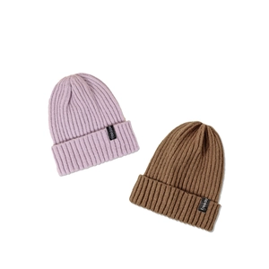 Winter knitted beanies in lilac and coffee brown with thick ribbed texture and fabric label