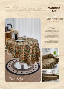 Close-up of jacquard sunflower tablecloth featuring thick fabric and white tassel edges